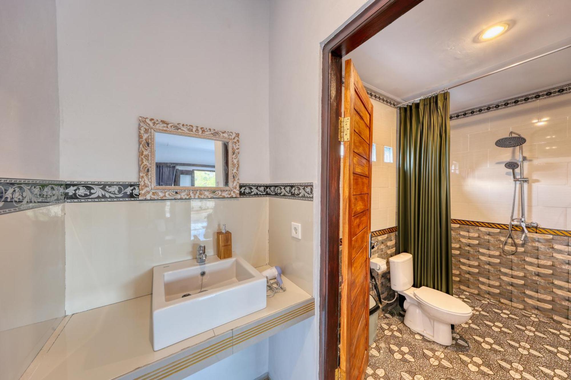 Mt Penida Bungalow Sakti Rom bilde